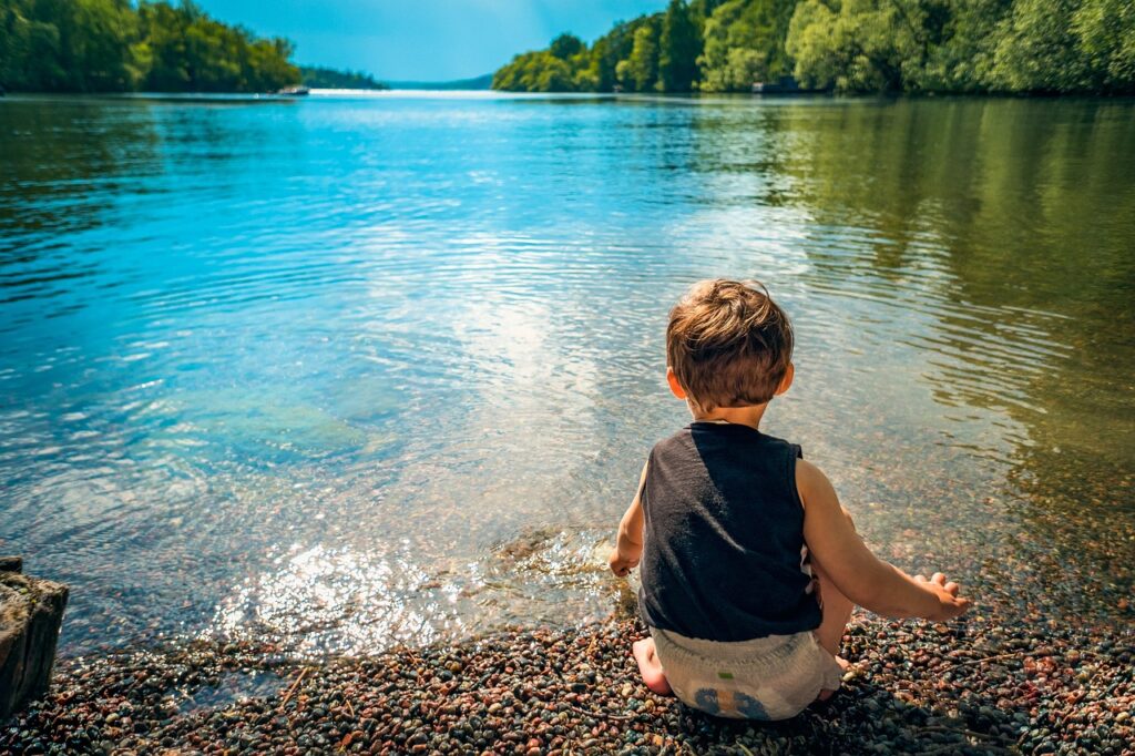 child, boy, lake, water, playing, toddler, kid, little, childhood, summer, happiness, nature, play, joy, white, caucasian, outdoors, beach, shore